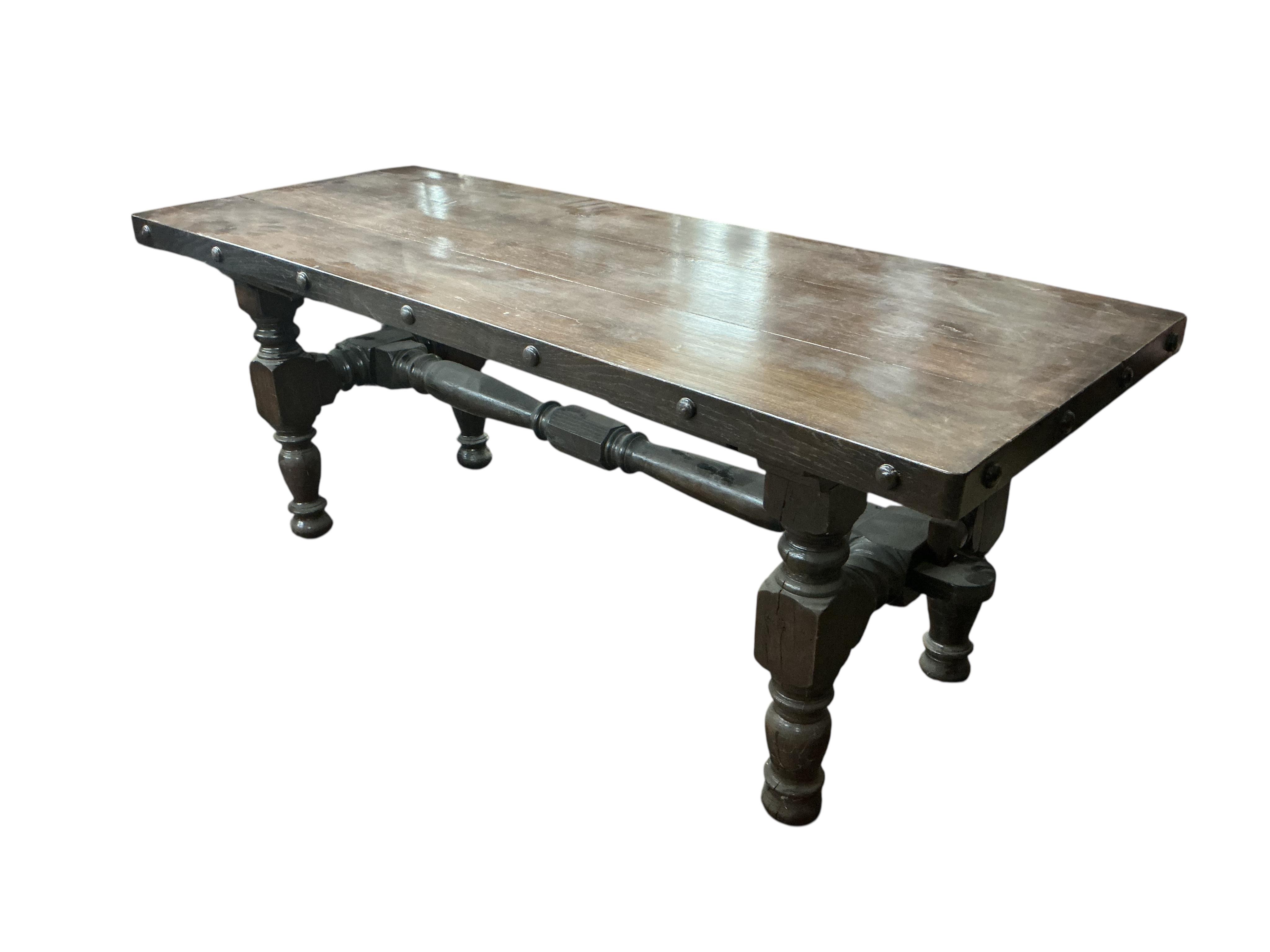 An 18th century style rectangular oak refectory dining table on turned underframe, width 186cm, depth 74cm, height 73cm